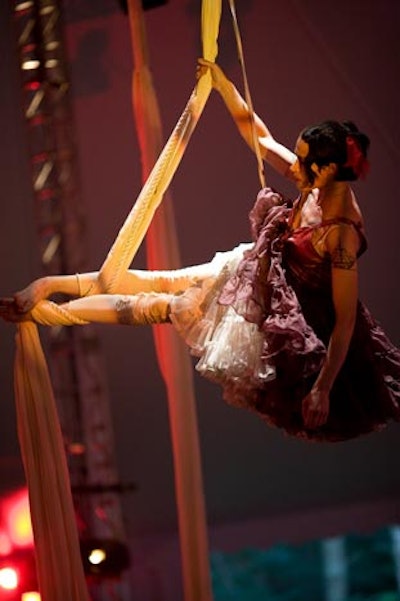 The Watermill Center dinner entertainment featured acrobats who used fabric suspended over the dance floor. Some questioned the wardrobe, which did occasionally malfunction.