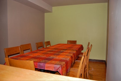 The smaller private room seats 8 to 10 guests.