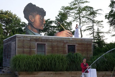 Performers stood on a rooftop for a piece called Grass Green.