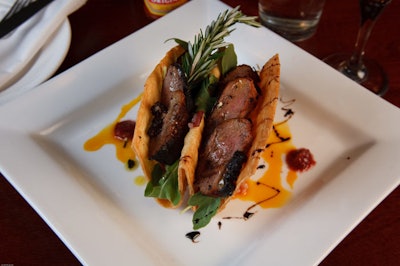 The Hudson Valley duck tacos combine molasses- and cola- marinated duck breast with cranberry and rosemary risotto and a truffle and cranberry glaze.
