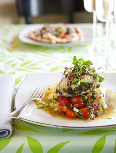 Dayboat Atlantic halibut with stewed artichoke hearts, roasted petite spring squashes, pistou, and baby tomatoes