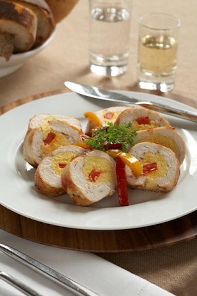 Ballotine of chicken stuffed with mascarpone polenta set on sauteed bell pepper