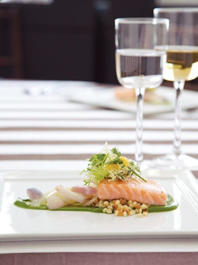 Slow-cooked Atlantic salmon with spinach puree, fregola, braised fennel, and heirloom radish