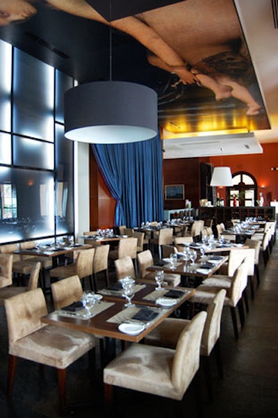 La Cofradia Ceviche Bar's dining room features a Renaissance-style painting on its ceiling.
