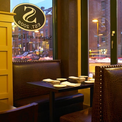 Booths look onto Tremont Street.