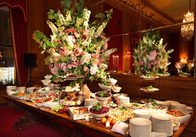 Mountains of food—including roasted baby artichokes, grilled portobello mushrooms, and asparagus tips—topped buffet tables throughout the venue.