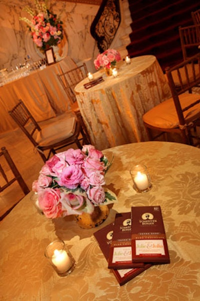 For decoration, the event team covered tables with pale gold linens and arrangements of Scharffen Berger chocolates.