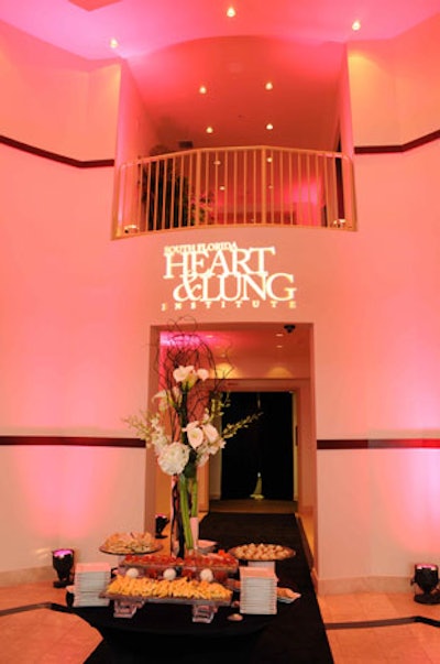 Armadillo Sound used pink lighting and a gobo of the institute's logo to decorate the lobby of the office building.