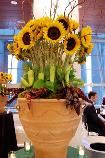 An arrangement of sunflowers and jalapeno peppers adorned the Mexican food station.