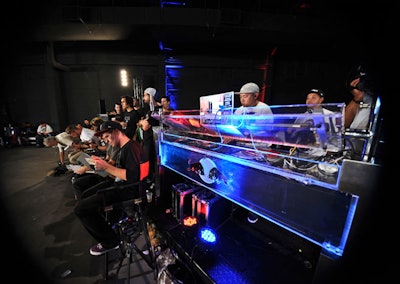 DJs LT Smash and Keen One each performed a three-hour set at the red- and blue-lit Lucite DJ booth.