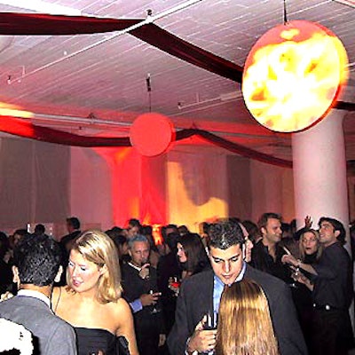 Ultravision's decor included red lights on the studio's white walls and abstract red and white images projected onto white disks suspended from the ceiling.