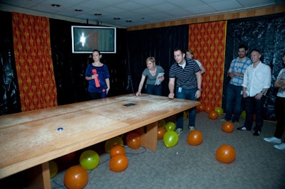 On one of the office building's floors, employees participated in a so-called 'disco shuffleboard' tournament.