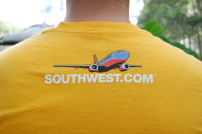Though coy in most of the on-site branding, Southwest made sure the back of staffers' uniforms sported the airline's logo.