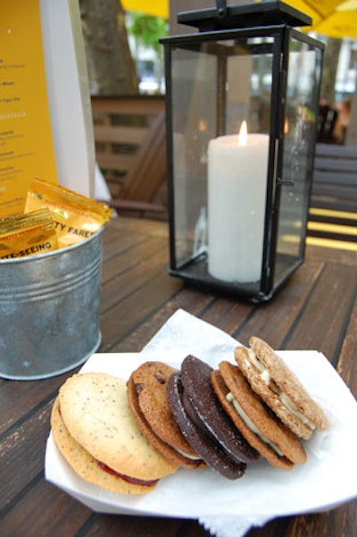 The porch's dessert offerings include a plate of cream-filled cookies.