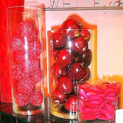 Eventstyle placed red objects in glass vases on Whitespace's front counter.