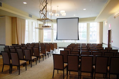The rooms at Columbia University's Faculty House are designed for meetings and presentations and come equipped with drop-down screens, projection gear, and video conferencing technology.