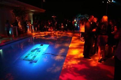 In the pool, LEDs illuminated signage showing the Malibu bottle.