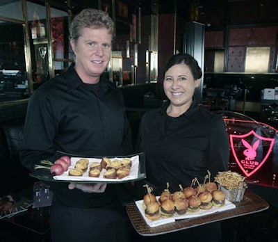 Passed snacks included mini Kobe burgers with Maytag blue cheese, steak-and-cheese egg rolls, and twice-baked potatoes with truffle essence.