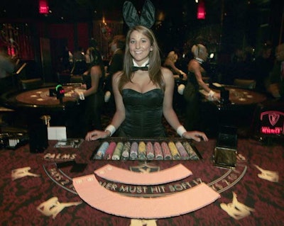 A dealer in Playboy Bunny garb beckoned players.