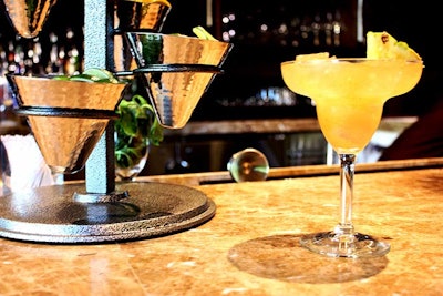 The Hideout serves specialty cocktails, along with a menu that includes comfort foods like mac and cheese and house-made potato chips.