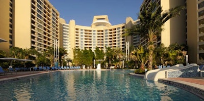 Photo: The tower curves around a zero-entry swimming pool.