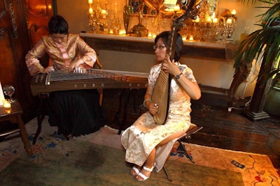 New Tang Dynasty TV and The Epoch Times International brought in Xianzi Ai and April Zhu, musicians who played the Chinese zither and the lute-like pipa, respectively.