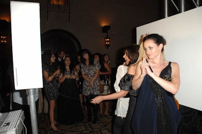 Post Grad star Alexis Bledel posed in the photo booth at the Gilt Groupe party.