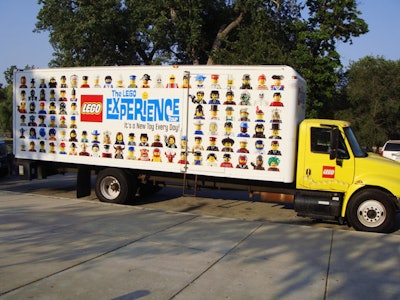 The box truck bears the name of the promotion.