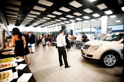 A pre-production model of the Cadillac 2010 SRX sat inside the showroom.