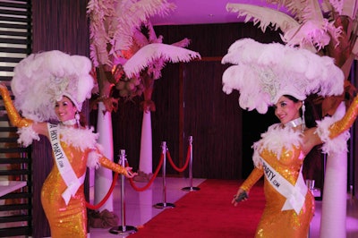 Las Vegas-style showgirls greeted arriving guests.