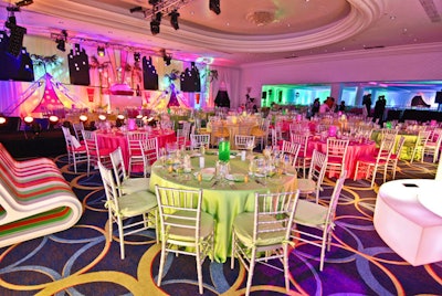 Brightly colored lighting, decor, and linens adorned the ballroom at the Eden Roc for the Art Deco-themed dinner.