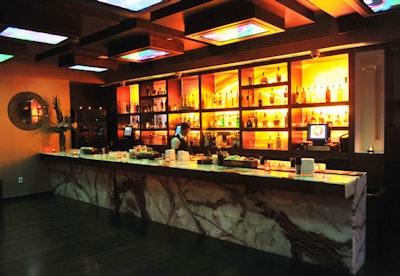 The lounge area holds 35 and has a separate bar and 12 ceiling-mounted TV screens showing a live feed of the restaurant.