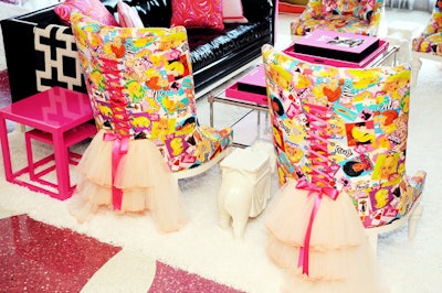 Lace-up skirted chairs evoke Barbie clothes.