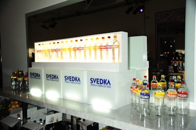 Svedka bottles with colorful labels deck the bars.