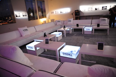 Svedka logos and white lounge seating created a clean, modern look.