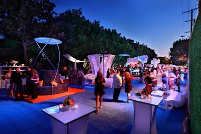 Cocktail tables were illuminated from within, and white light brightened pod-like fabric clusters throughout the space.