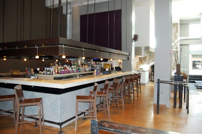 The 21-seat bar has a polished cement floor and bar top.