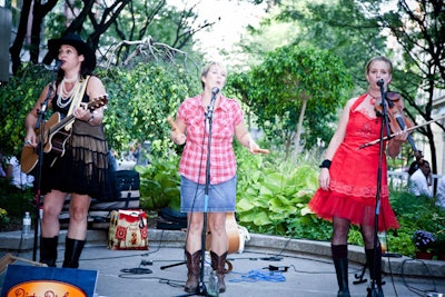 Busker band the Dirty Dishes played for guests in the courtyard outside the venue.