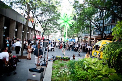 Guests mingled in the courtyard outside the St. Lawrence North Market, where vendors such as Tiny Tom Donuts and Grandpa Ken's Peameal Bacon served food prior to the indoor reception.