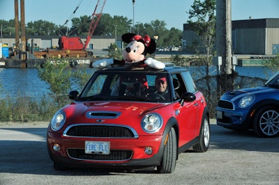 One driver displayed an oversize Minnie Mouse from the sunroof of his red Mini.