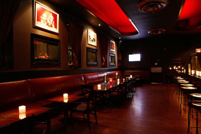 Burgundy leather banquettes line the wall of the lounge, once a haunt of Al Capone.