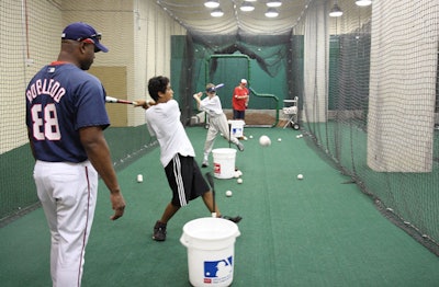 Bullpen catcher Nielson Robledo oversaw the hitting in the indoor batting cage.