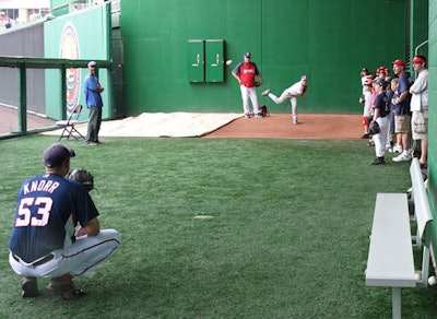 Bullpen coach Randy Knorr doled out pitching tips along with pitching coach Steve McCatty.