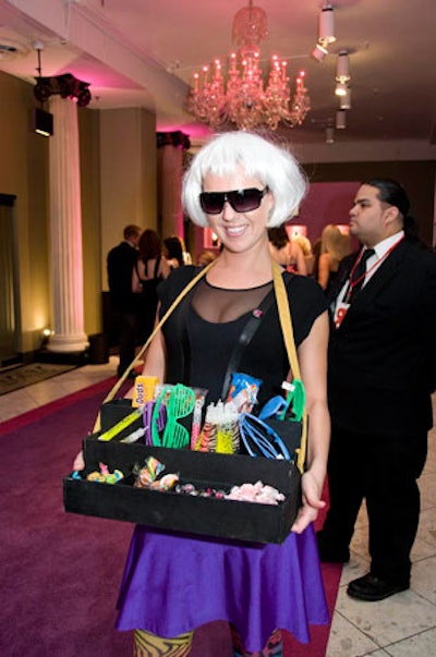Roaming servers offered trays of light sticks, candy, and louvered sunglasses.