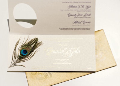 Eva used a peacock feather on the invite and save-the-date for the Y.M.C.A.'s fund-raiser last October.
