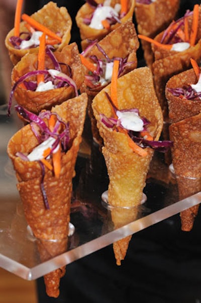 Bite catered fish tacos in crispy cones.