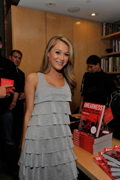 Actress Alexa Vega posed with books from Awearness.