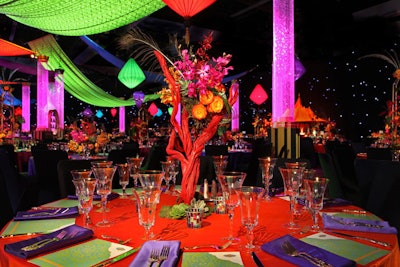 La Premier's floral arrangements included 9,000 orchids, 20,000 roses, 3,000 pheasant and peacock feathers, and 600 colorfully painted Manzanita branches.
