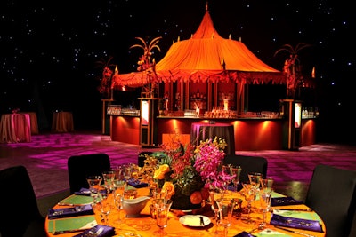 Purple napkins popped against orange tablecloths.