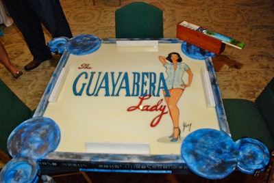 The Guayabera Lady provided hand-painted domino tables for the domino tournament.